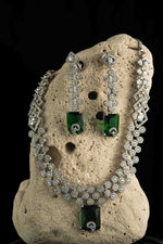 Rhodium Plated Pendant Set Studded With Zircons And Emerald Stones | NarNari | NNNd130