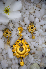 Ruby and kundan studded pendant with matching earring | NarNari | NNPd253